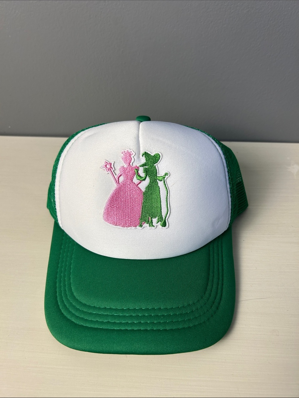 Green Trucker Hat with Elphaba and Galindo